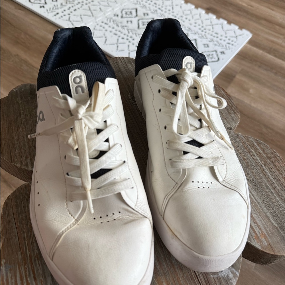 On Running White and Black Sneakers Sleek Design